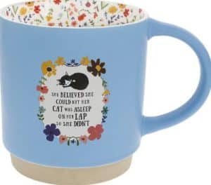 black cat on blue mug