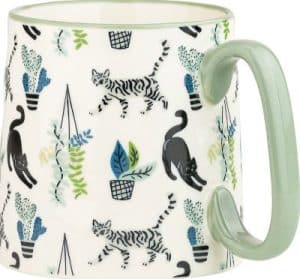 stretching black cat mug